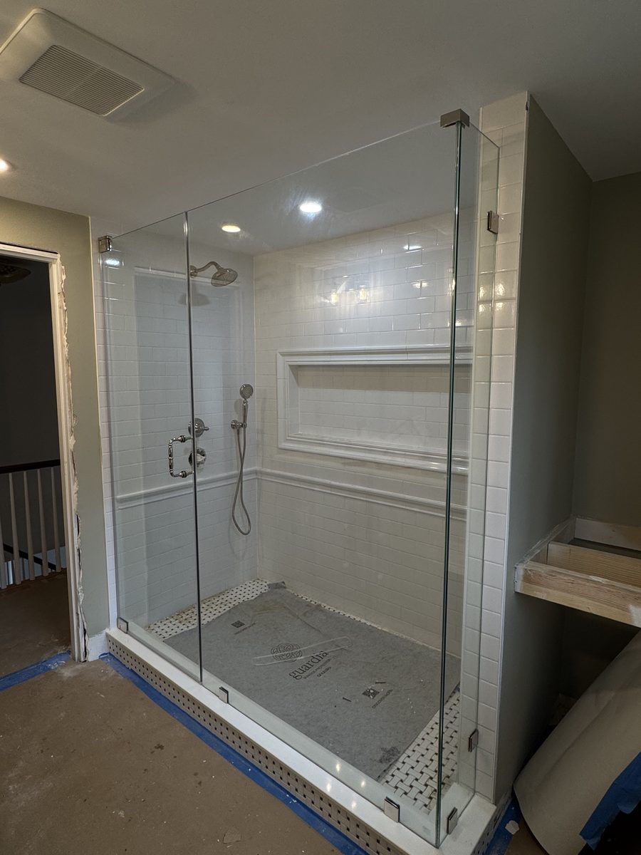 custom frameless glass shower enclosure chrome hardware Peabody MA